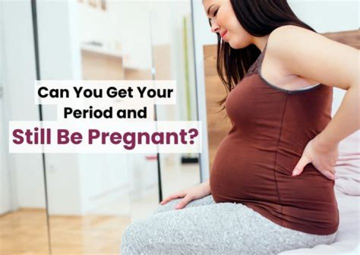 Can you get a full period and still be pregnant?