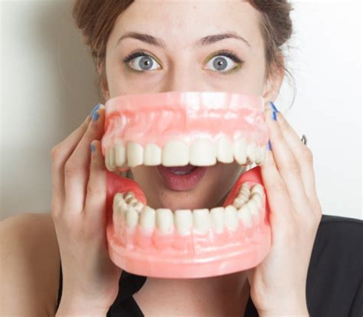 Can you live with false teeth?