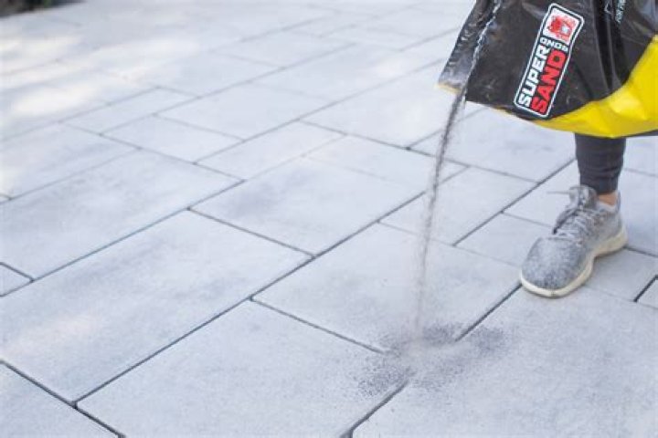 Can you put new polymeric sand over old polymeric sand?
