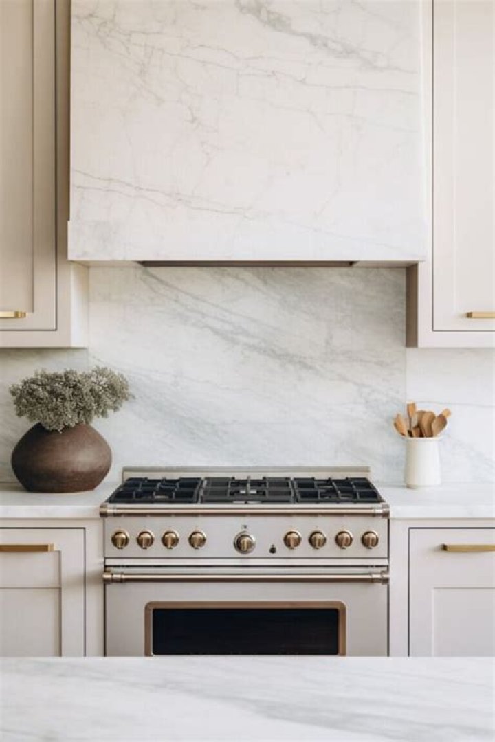 Can you put quartz behind a gas stove?