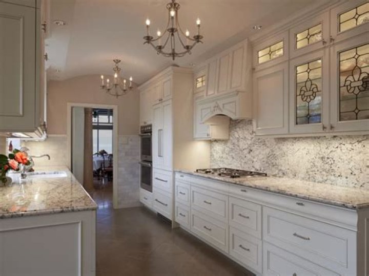 Can you reuse granite countertops when replacing cabinets?