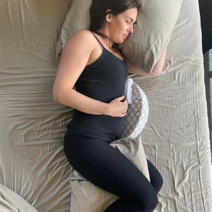 Do mothers sleep lighter?