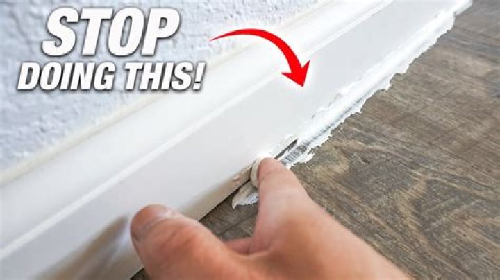 Do you caulk baseboards to vinyl flooring?