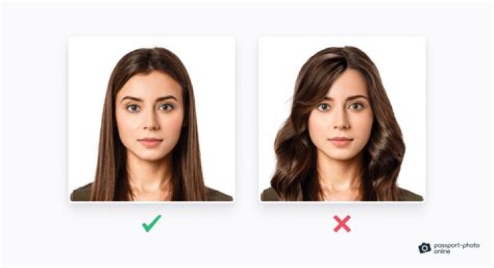 Do you have to have your hair tucked behind your ears in passport photo?