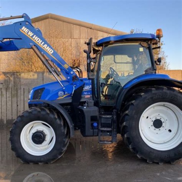 Does AGCO own New Holland?