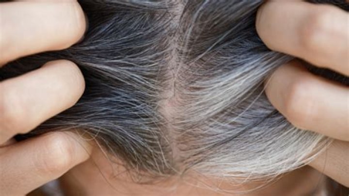 Does white hair make a person look older?