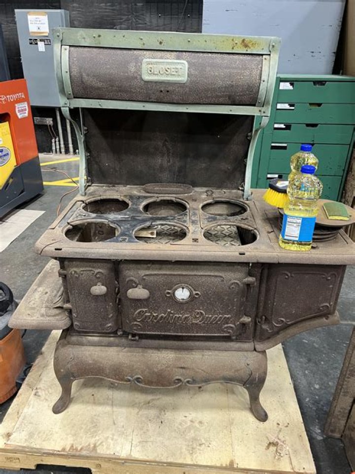 How do you clean a cast iron stove outside?