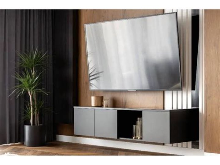 How far should you sit from a 65 TV?