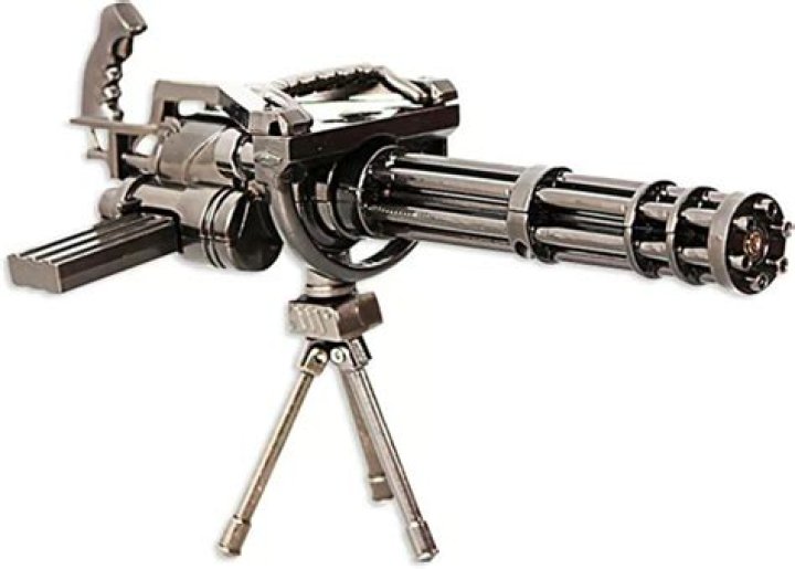 How much does it cost to fire the Heavy's minigun for 12 seconds?