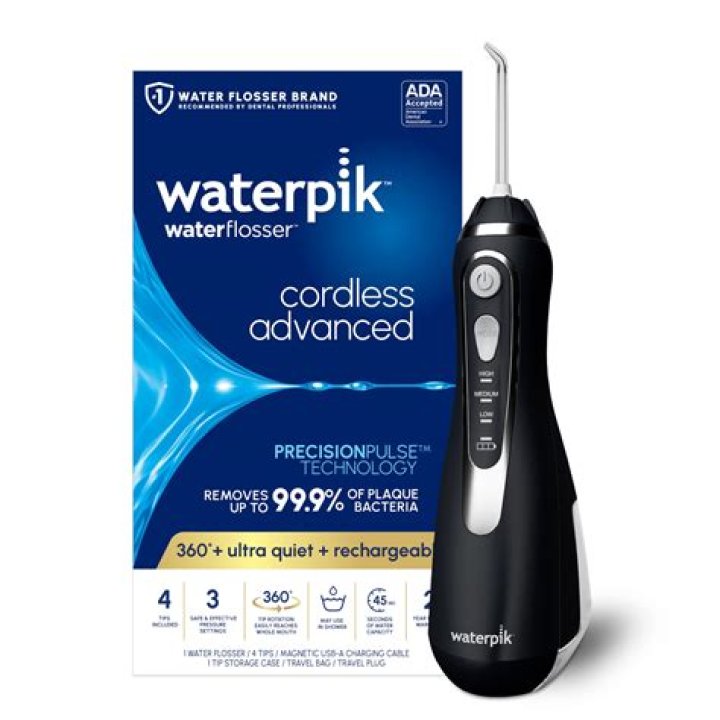 Is a Waterpik better than brushing?