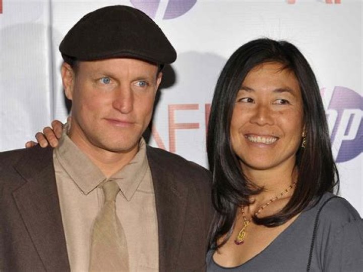 Is Brett Harrelson Woody's brother?