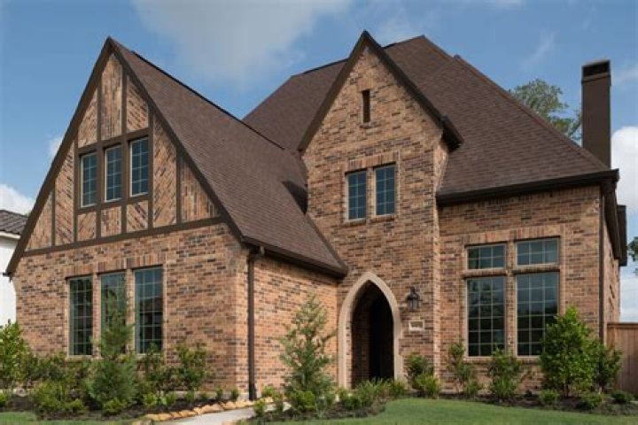 Is brick house better than siding?