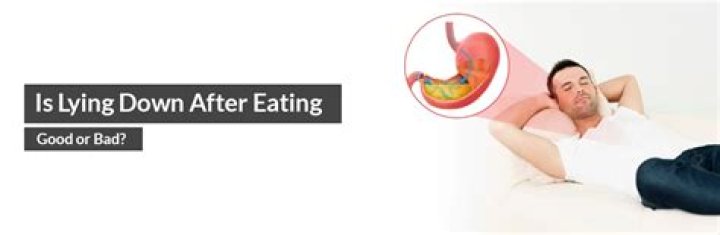 Is it better to sit or lay down after eating?