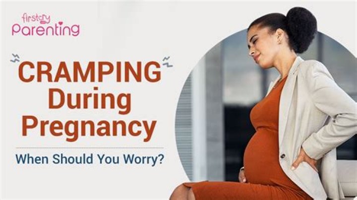 Should I be cramping at 3 weeks pregnant?