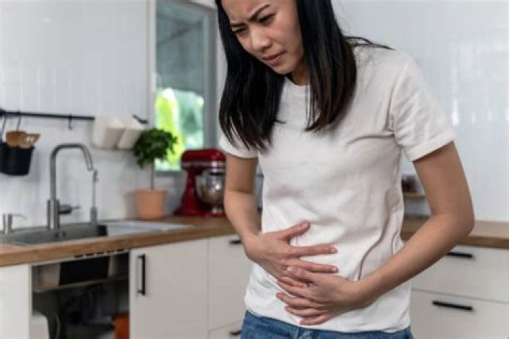 What are the symptoms of trapped gas?