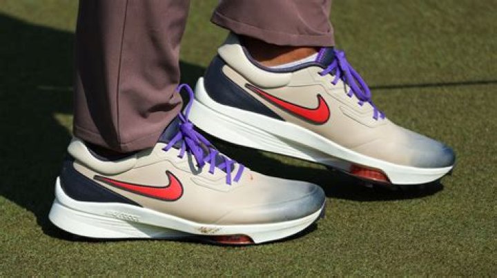 What brand of golf shoes does Brooks koepka wear?