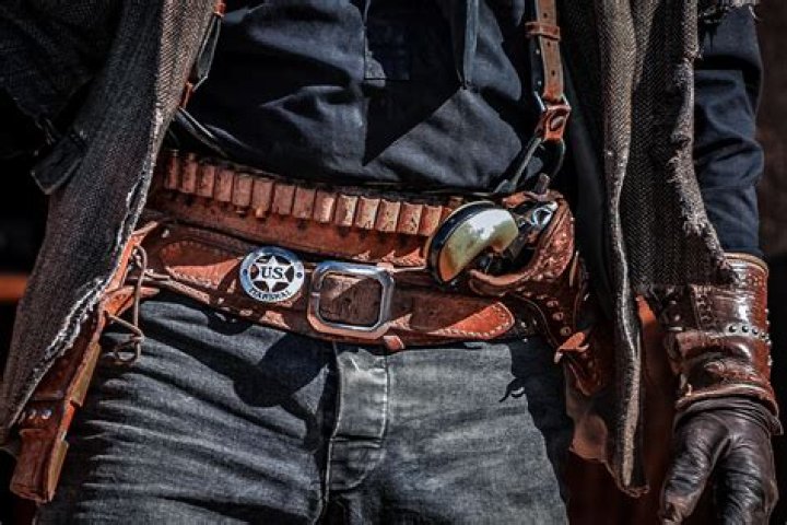 What caliber lever-action did Cowboys?