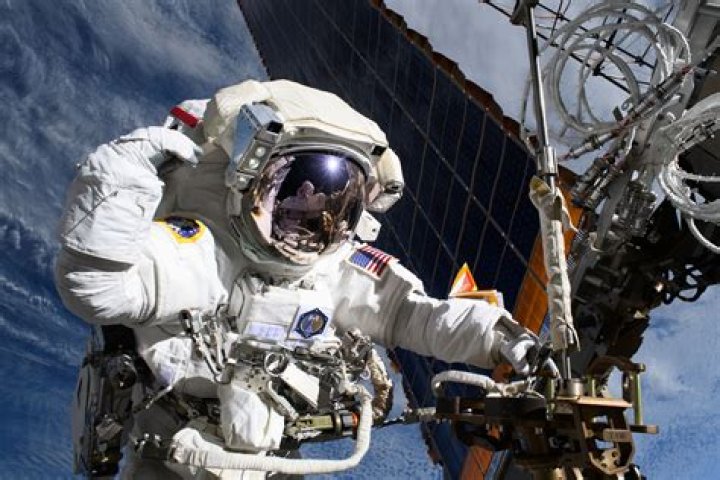 What do astronauts do on a space walk?