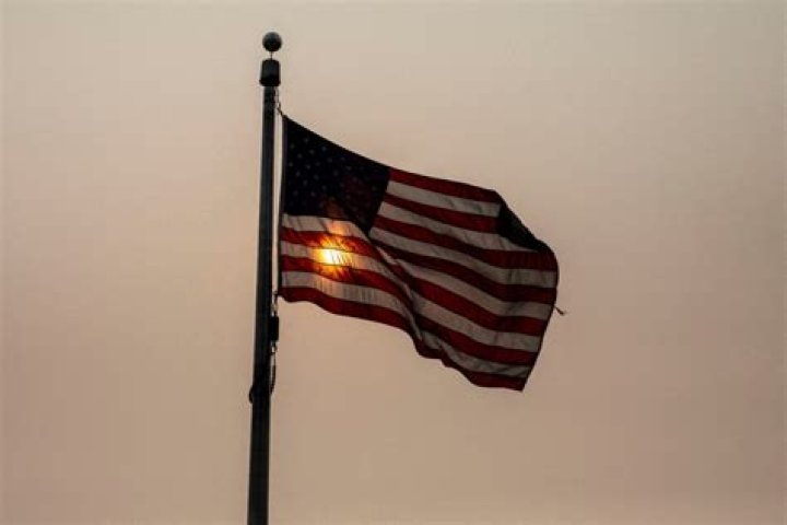What does American flag with orange stripe mean?