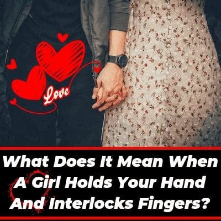 What does it mean when a girl holds your hand and interlocks fingers?