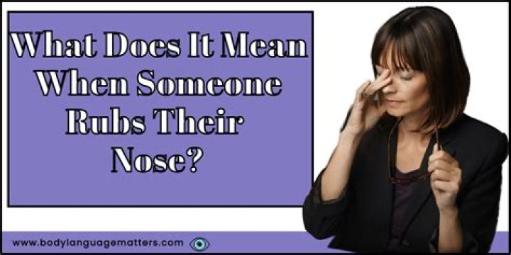 What does it mean when someone rubs the back of their head?