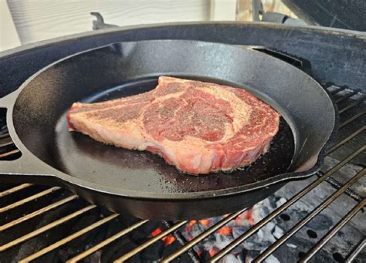 What is the black coating on a cast iron skillet?