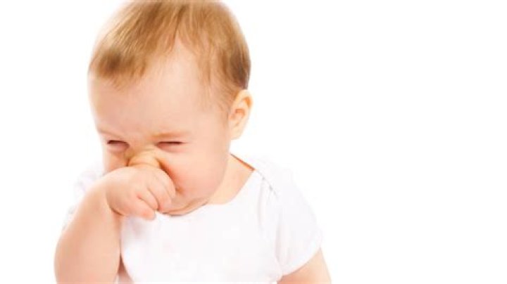 When do babies stop scratching their face?