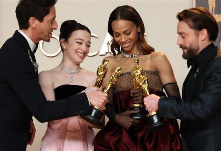 Who is the oldest person to win an acting Oscar for what movie *?