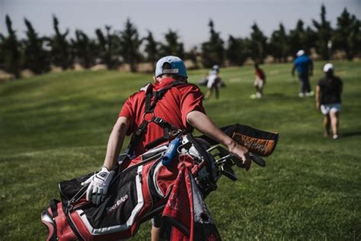 Why do golfers carry their bag?