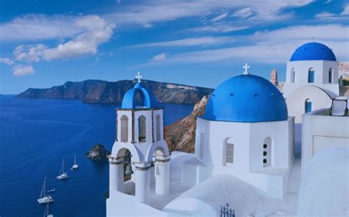 Why do Greek houses have domed roofs?