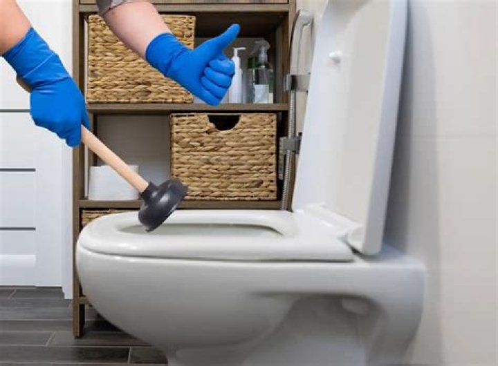 Will hard poop dissolve in a clogged toilet?